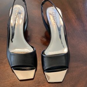 Black leather sling backs.